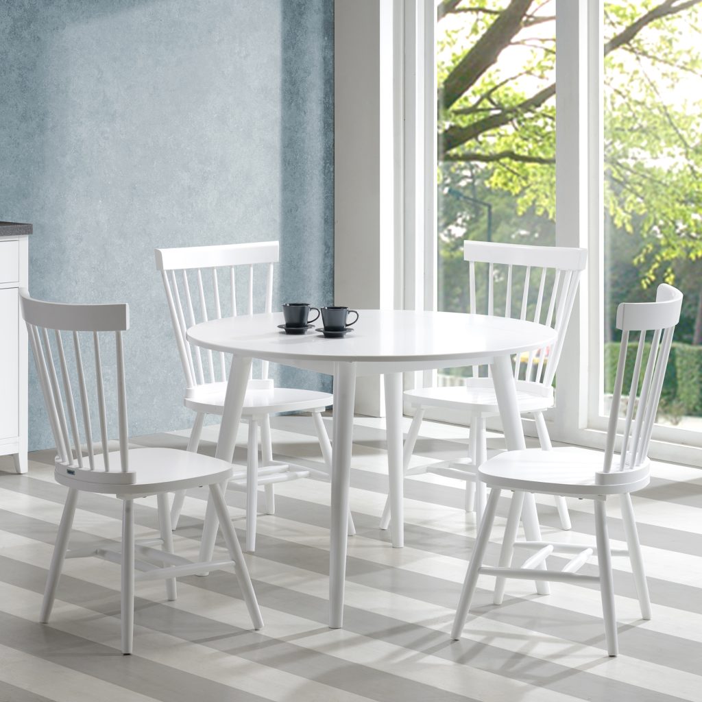 Eliminate that heavy feeling in your kitchen by replacing your dining table with something lighter.